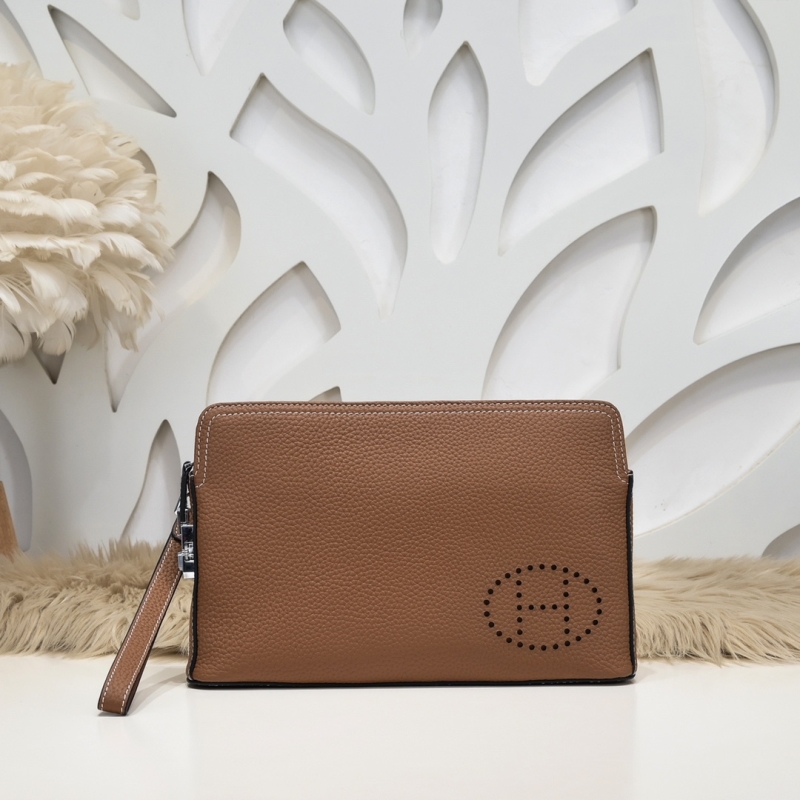 H**mes clutch bags